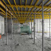 <b>Efficient slab system:</b> The Dokadek 30 panel floor system facilitated rapid and simple formation of large residential floor areas, allowing early striking and reducing material volume. [Copyright: Doka]