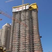 Doka Self-climbing formwork systems decrease the necessity of crane, saves time and money. Copyright: Doka