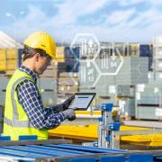 Worker checking stocks with the help of a tablet.