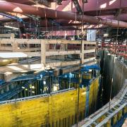 
<br />
The pier formwork is suspended on the steel structure, which in turn is supported by the sheet-piled cofferdams. For the next pouring cycle, rather than moving the formwork, the previously cast pier sections are lowered to the ground.
<br />

<br />
Photo: Kattwyk_3.jpg
<br />
Copyright: Doka
<br />

<br />
