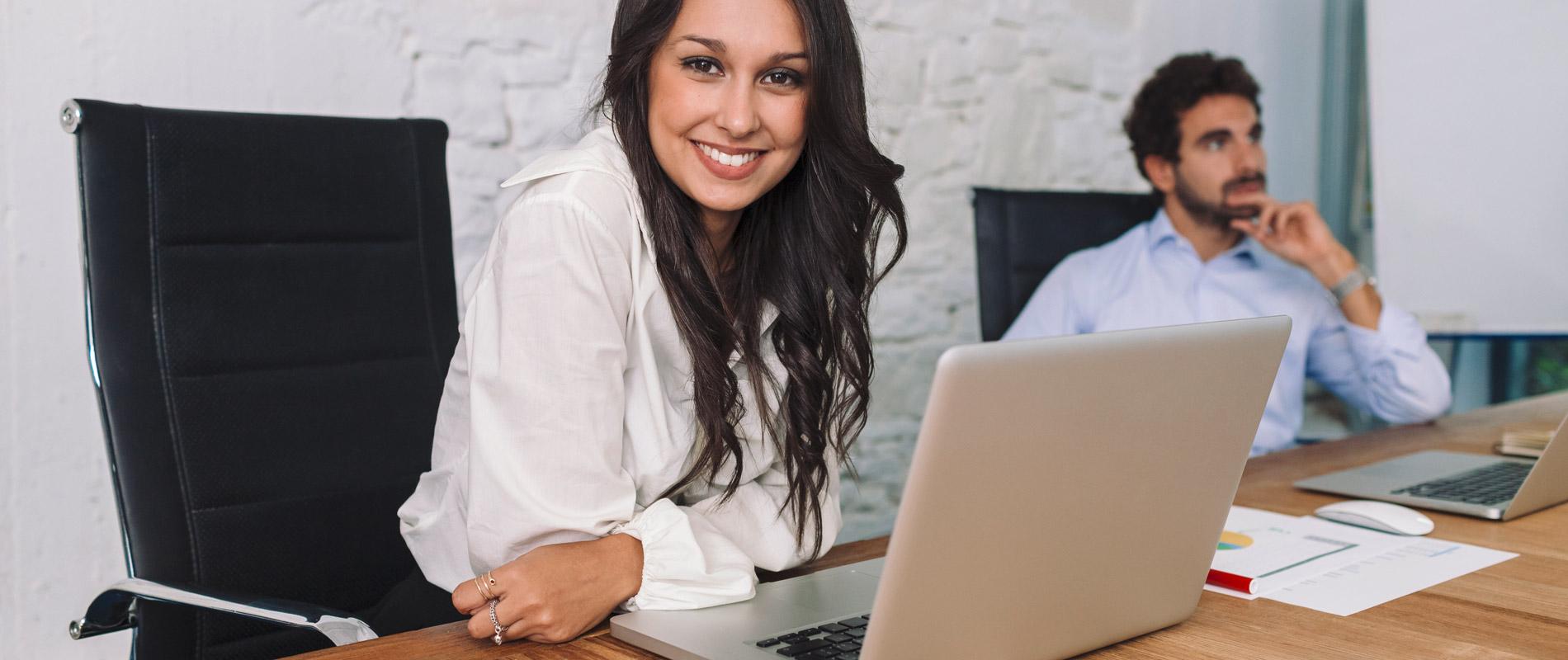 smiling young woman with notebook
